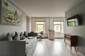 Loft design studio apartment & FREE parking in Riga